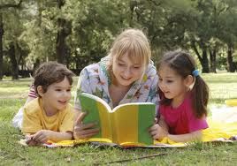Mother reading to her children 